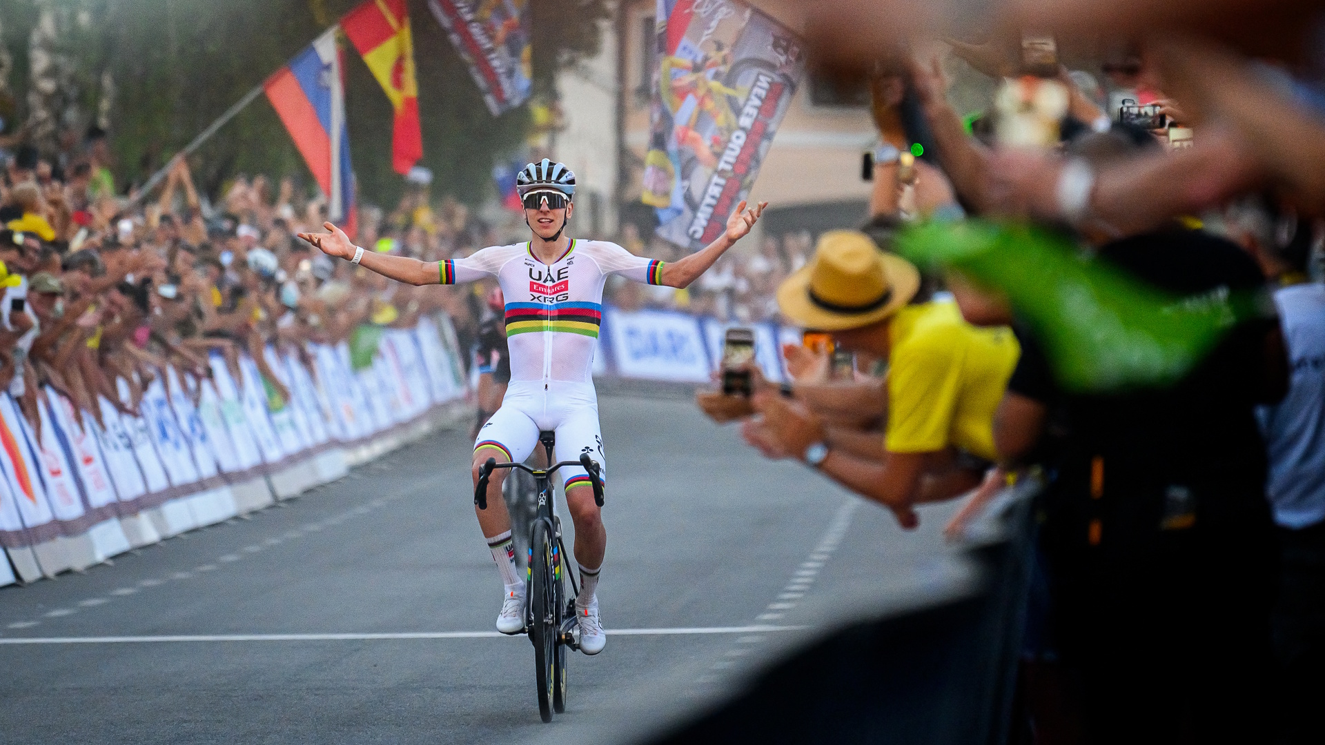 Tour de France's five-time winner Slovenian rider Tadej Pogacar celebrates as he wins a race stage.