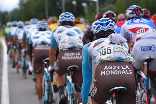 Extra gear packed in a AG2R rider's pockets.