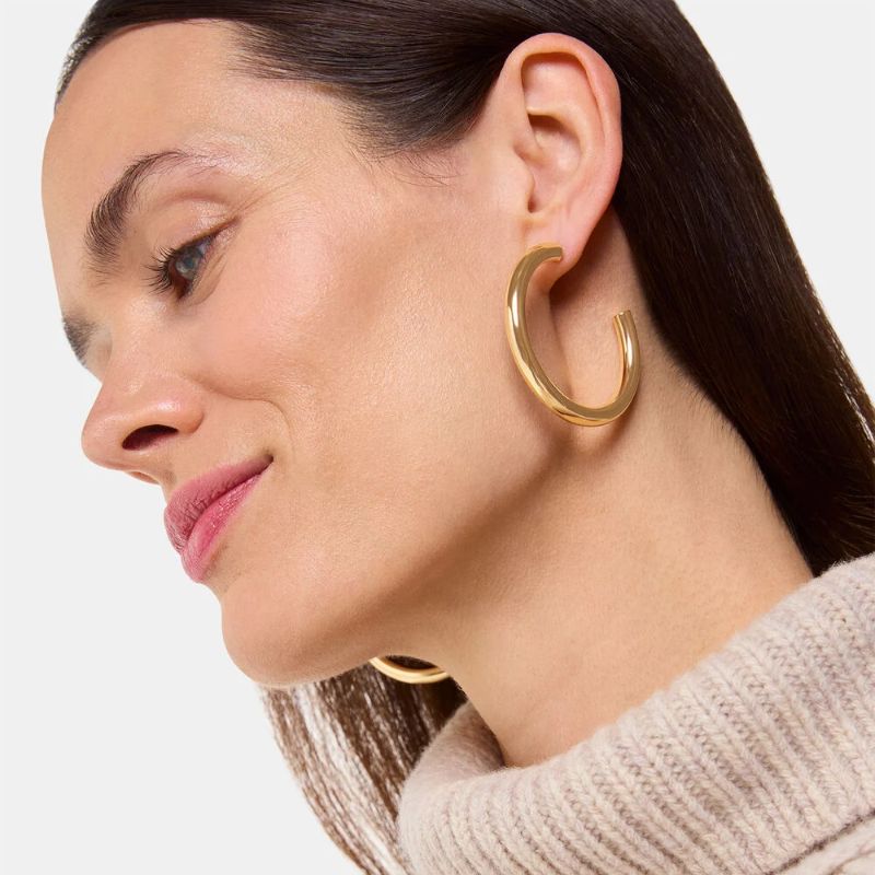 Gold Tubular Large Hoop on model 