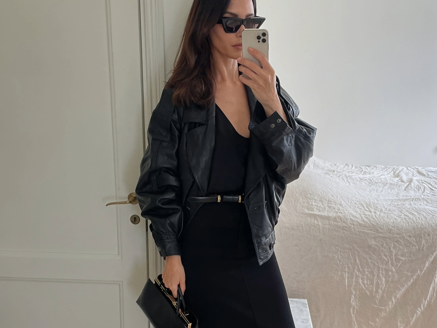 Johanna Piispa in a black leather bomber jacket and Dehanche belt