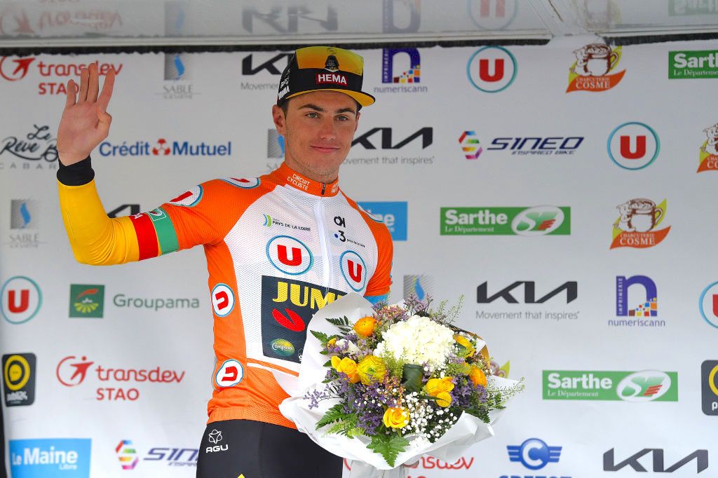 LA CHAPELLE-SAINT-AUBIN, FRANCE - APRIL 08: Olav Kooij of Netherlands and Team Jumbo - Visma orange stage winner jersey celebrates at podium as stage winner during the 68th Circuit Cycliste Sarthe - Pays de la Loire 2022 - Stage 4 a 136,4km stage (shortened due to bad weather conditions) from La Chapelle-Saint-Aubin to La Chapelle-Saint-Aubin / #CircuitSarthe / on April 08, 2022 in La Chapelle-Saint-Aubin, France. (Photo by Dario Belingheri/Getty Images)