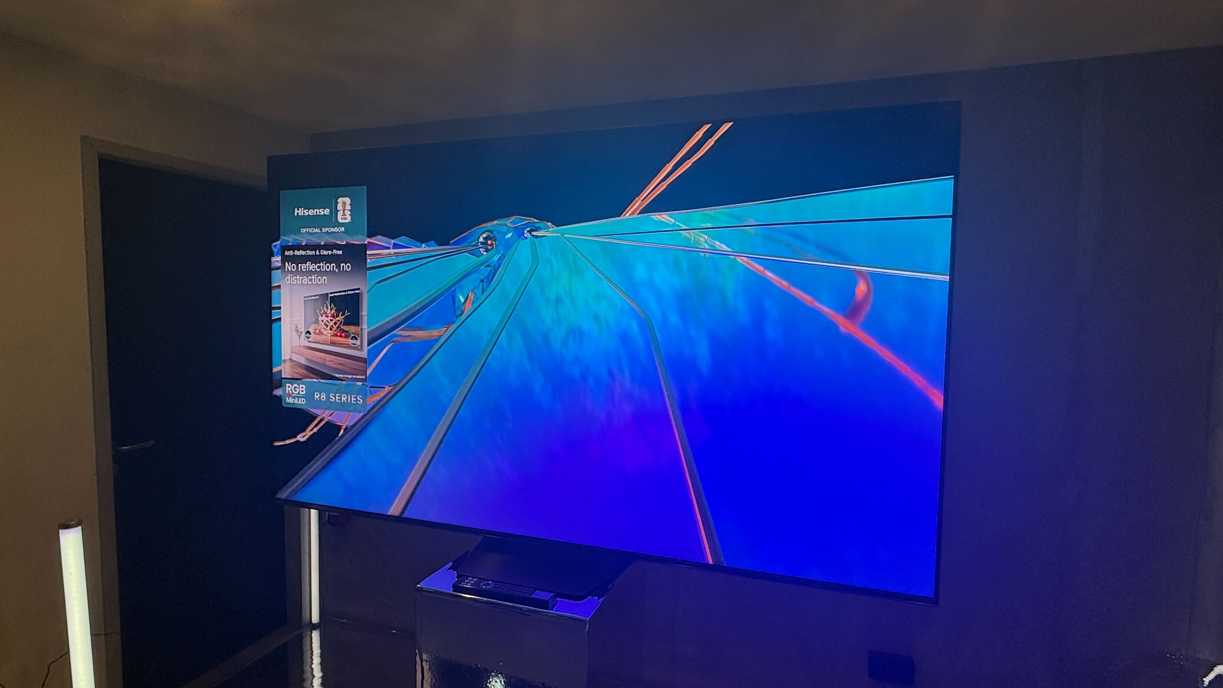 Hisense UR8 on a stand at a press event