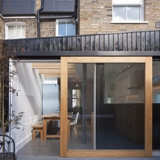 house exterior with sliding doors