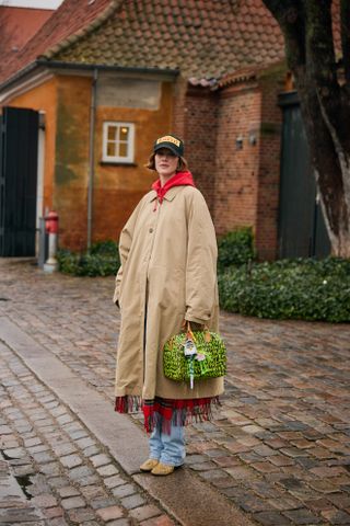 women at Copenhagen Fashion Week carrying vintage it bags to the Fall 2025 shows