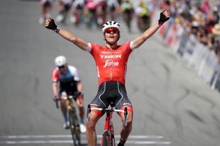 Trek-Segafredo's Toms Skujins celebrates winning stage 3 at the 2018 Tour of California from Sean Bennett (Hagens Berman Axeon)