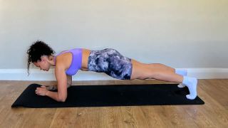 Jade demonstrating the 'down' version of up and down plank