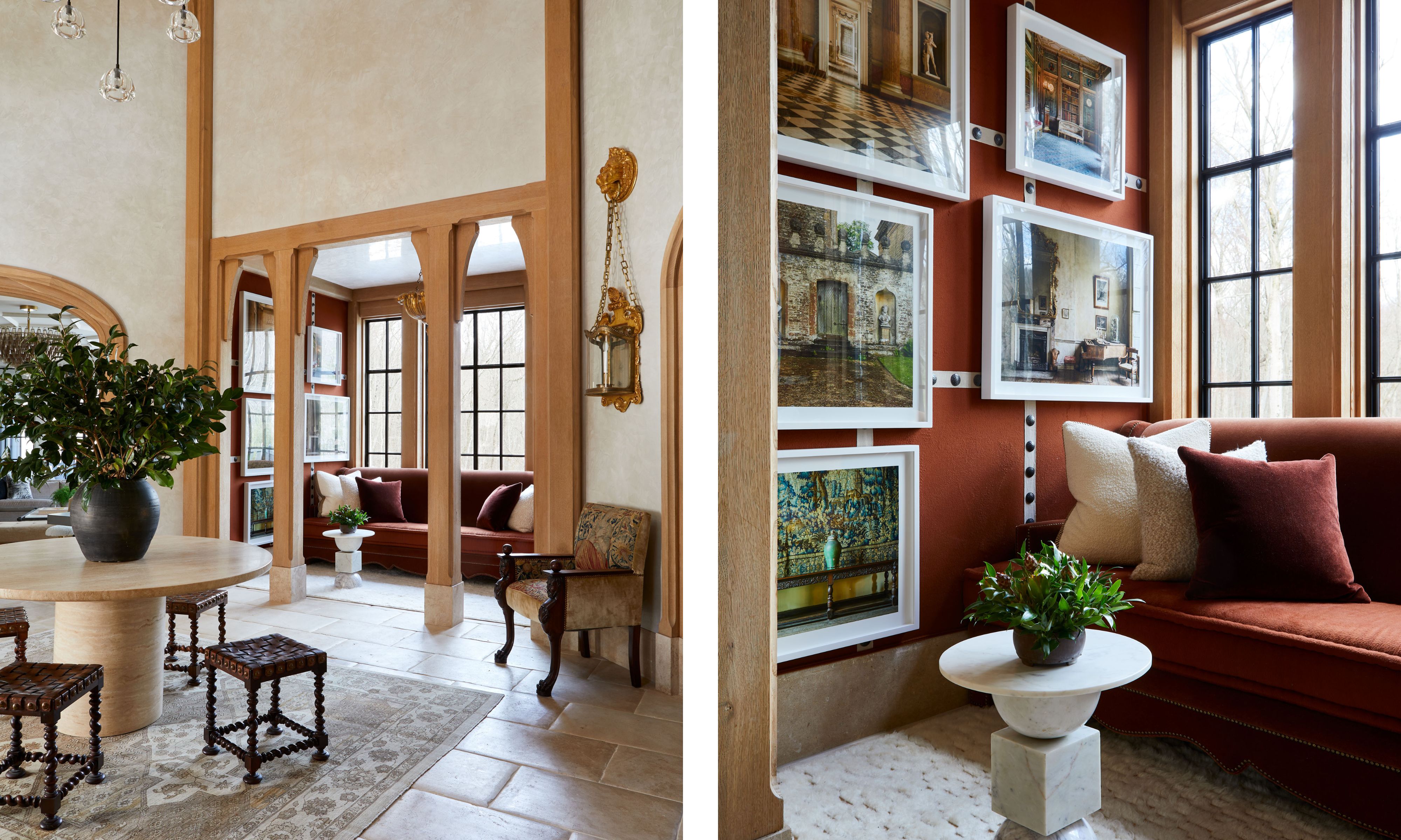 A large, grand entrance hall with cream plaster walls, exposed woodwork, stone flooring, and antique decor. A snug room with dark red walls, artwork on the wall, and a dark red sofa with cushions in front of a window.