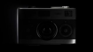 Rollei 35AF film camera in low key lighting on black background