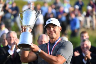 Brooks Koepka with the 2018 US Open trophy.