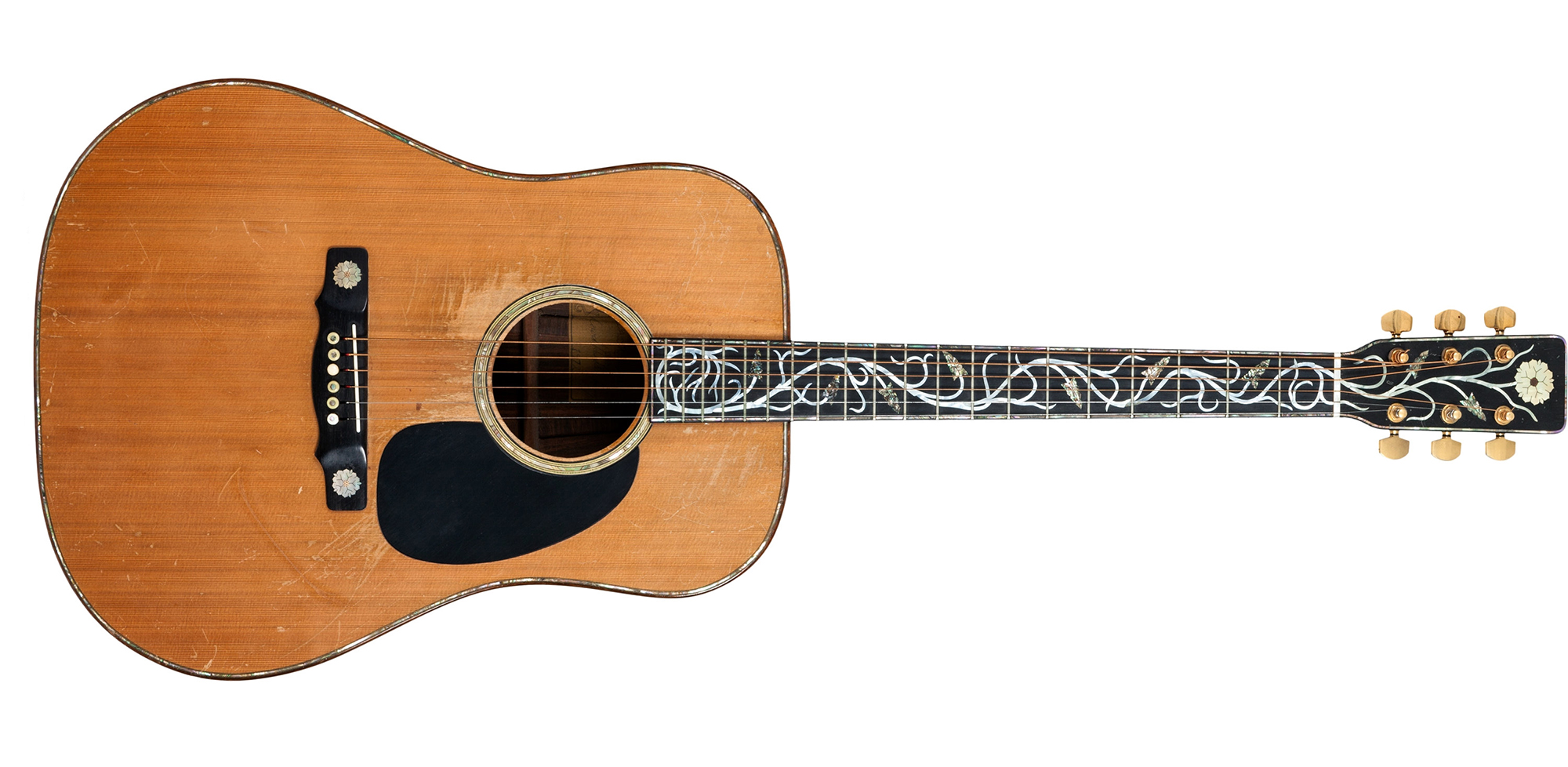 A photo of Gram Parsons' 1972 David Russell Young dreadnought acoustic guitar.