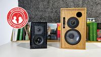 KEF LS3/5A and Graham Audio LS5/9 on white desk