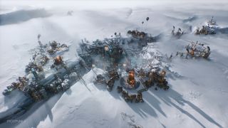 An overhead view of a city in Frostpunk 2.