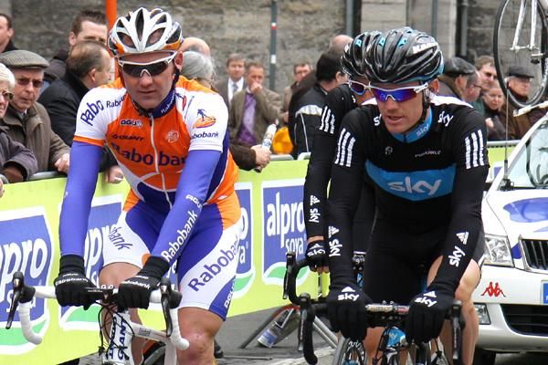 Australian riders Graeme Brown (l) and Chris Sutton ride to the sign on.