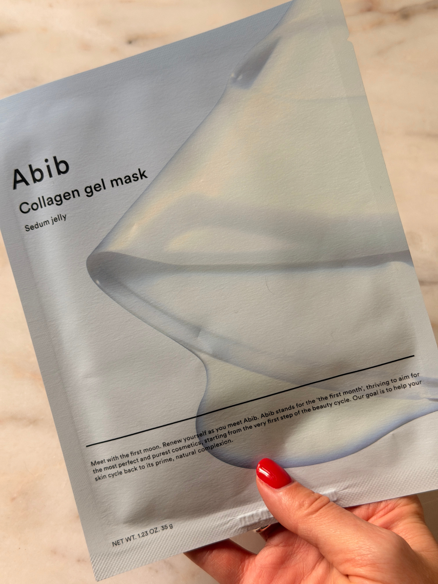 Freelance beauty editor Grace Day holding the Abib face mask