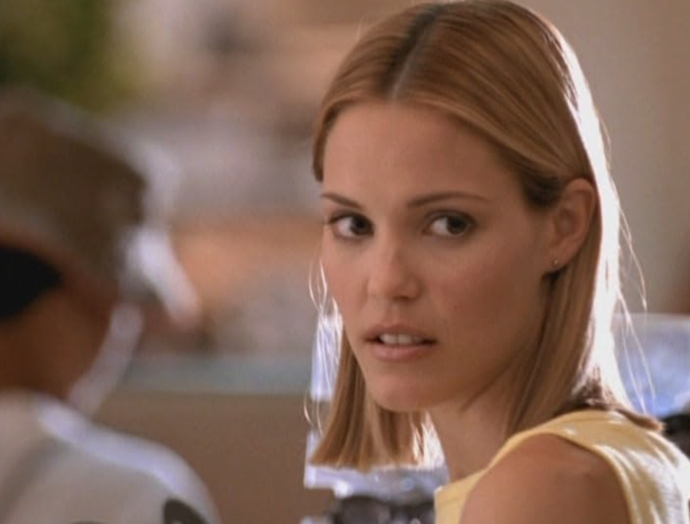 Leslie Bibb looks over her shoulder as she stars in 'Popular'