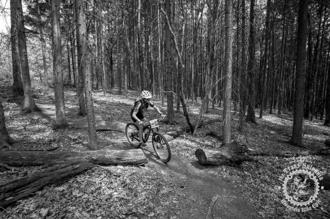 NoTubes Trans-Sylvania Epic Experience rider Car lota Moncada smiles through the gorgeous Pennsylvania forests.