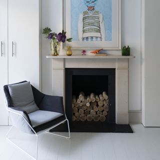 living room with fireplace and flower in vase