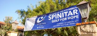 Spinitar banner welcomes guests and sponsors of the fifth annual Golf for Hope tournament.