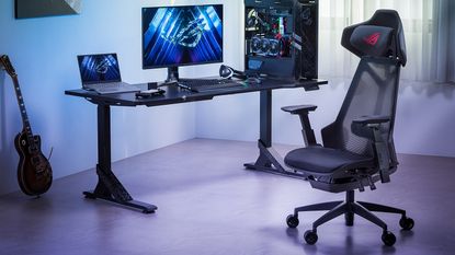 Asus ROG Destrier Ergo gaming chair from the front with a gaming PC