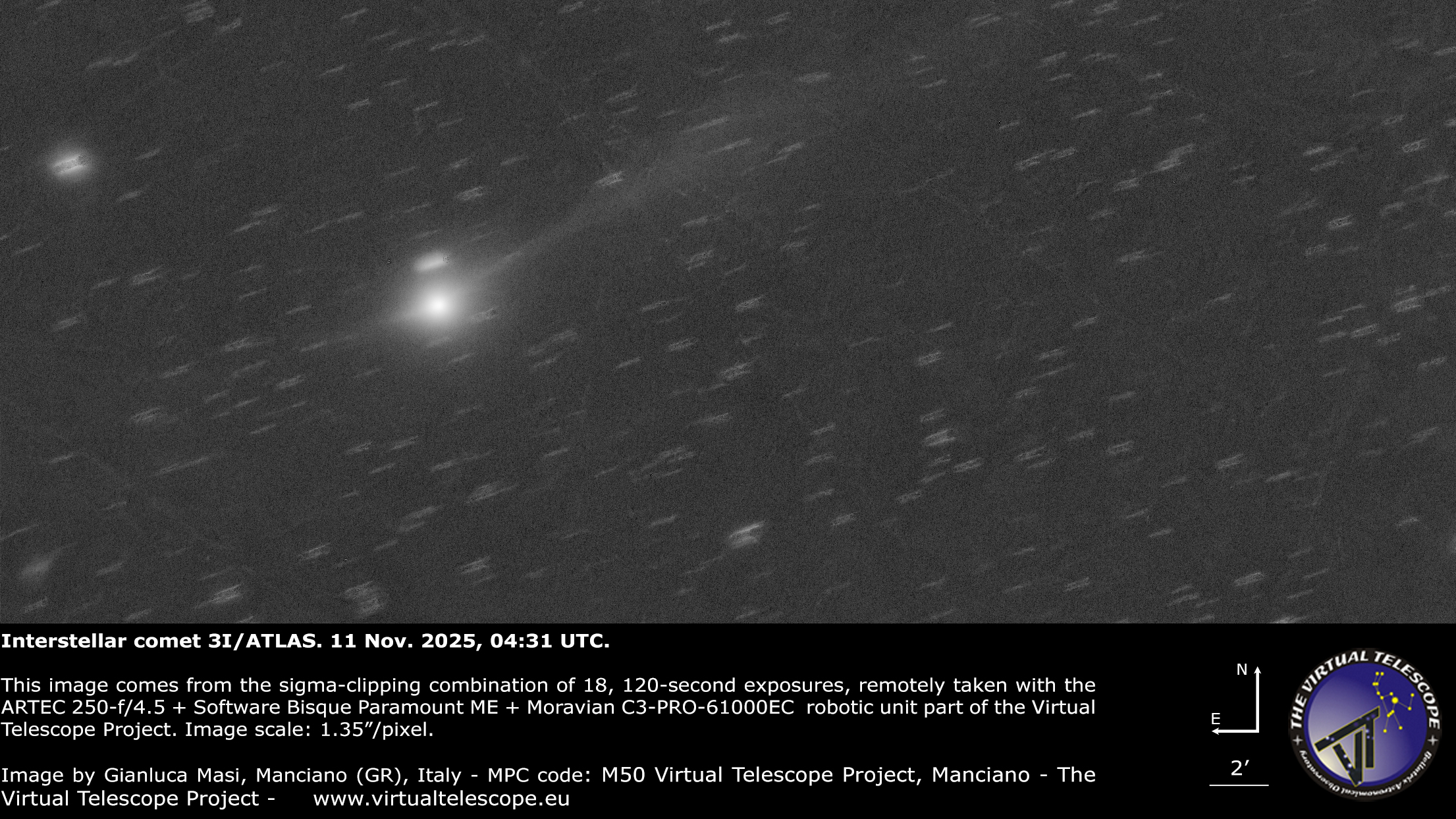 A bright, fuzzy point of light representing a comet's central coma is visible shining to the lower left of an image, with a faint tail extending to the upper left lof the screen. Points of light representing stars are visible in the black sky beyond.