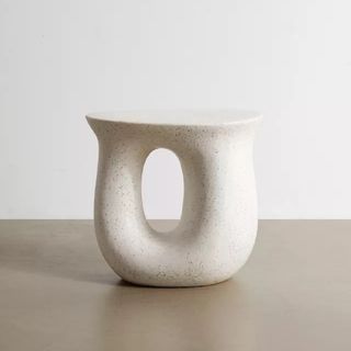 A ceramic sculptural side table