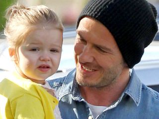 David Beckham steps out with daughter Harper.