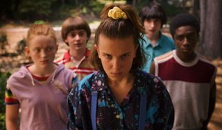 Stranger Things 3 Eleven stares menacingly in front of her pals