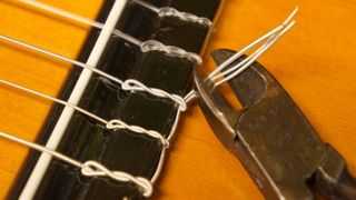 Trimming nylon string ends with wire cutters