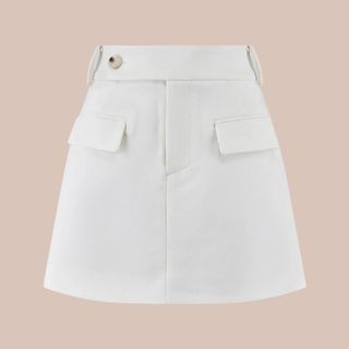 Flat lay image of a white skirt 