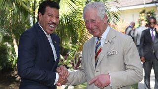 King Charles shaking hands with Lionel Richie