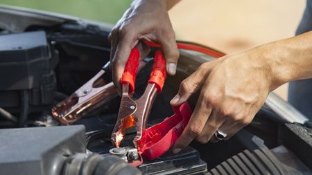 best jump starter: person using a Jump starter