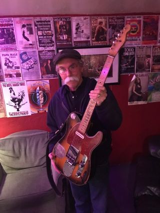 Gene Parsons with Clarence White's Fender Telecaster, which now belongs to Marty Stuart. (Photo: Lee Rider)