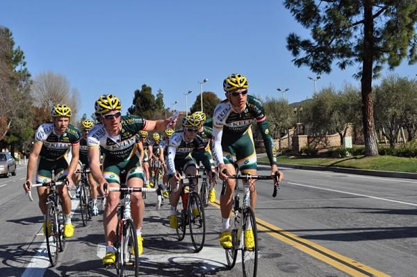 Scott Zwizanski has the map and signals a left turn on the Tour of California circuit.