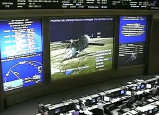 The view from Russia's Mission Control Center just after the successful launch of the unmanned Progress 48 cargo ship toward the International Space Station on Aug. 1 EDT, 2012.