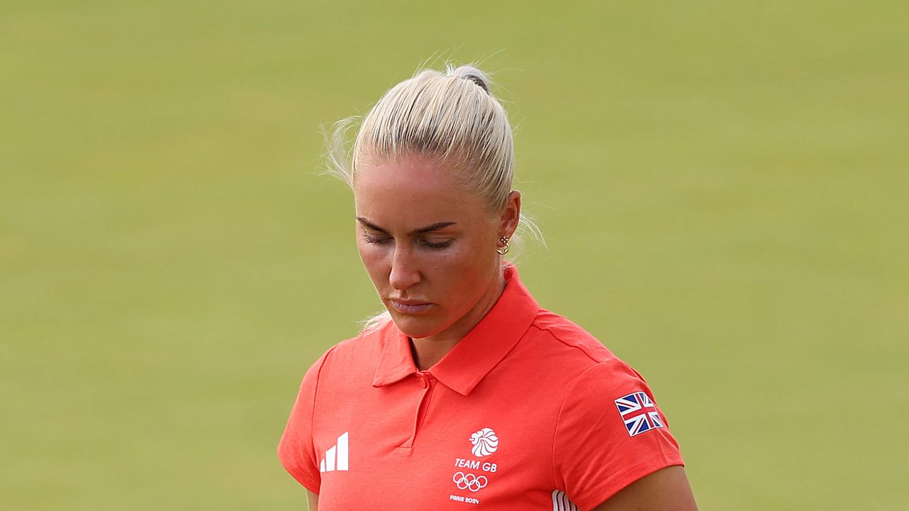 Charley Hull looks down disappointedly at the Paris 2024 Olympic golf tournament