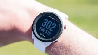 The Garmin Approach S12 GPS Golf Watch on a green background