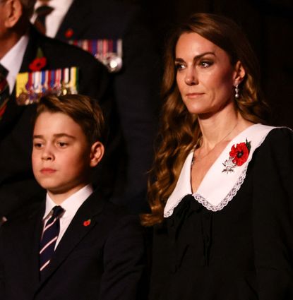 Prince George and Princess Kate wearing black outfits