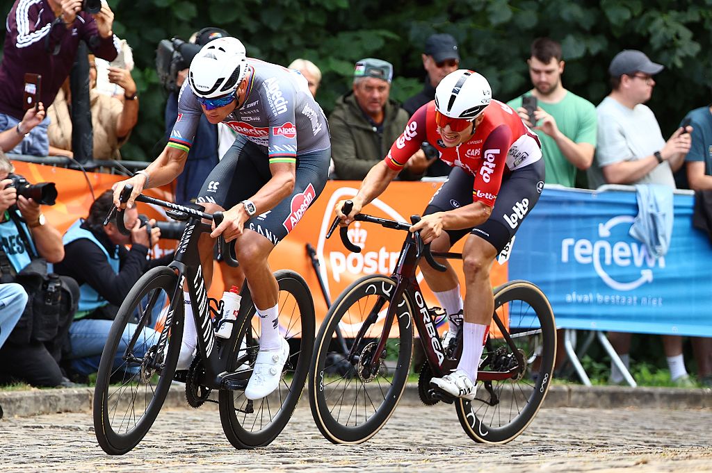 Dutch Mathieu van der Poel of Alpecin-Deceuninck and Belgian Arnaud De Lie of Lotto Cycling Team pictured in action during the third stage of the 'Renewi Tour' multi-stage cycling race, from Aalter to Geraardsbergen (179,9 km) on Friday 22 August 2025. The five-day race takes place in Belgium and the Netherlands. BELGA PHOTO DAVID PINTENS (Photo by DAVID PINTENS / BELGA MAG / Belga via AFP)