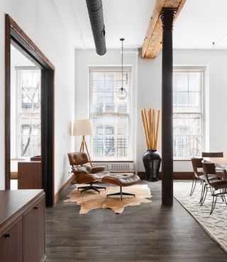 a loft apartment with groups of furniture