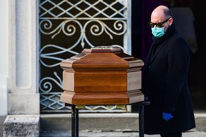A mourner in Lombardy, Italy.