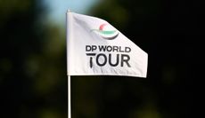 A DP World Tour flag flutters in the wind