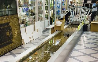 The Tyburn stream (which flows into the Thames) in the basement of Gray's Antiques in Davies Street, W1. London.