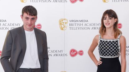 Paul Mescal and Daisy Edgar-Jones socially distant attend the Virgin Media British Academy Television Award 2020 at Television Centre on July 31, 2020 in London, England.