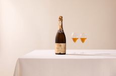 bottle of 1926 Ruinart with glasses