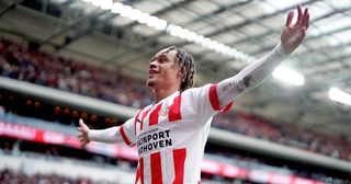Xavi Simons of PSV celebrates 2-0 during the Dutch Eredivisie match between PSV v Ajax at the Philips Stadium on April 23, 2023 in Eindhoven Netherlands