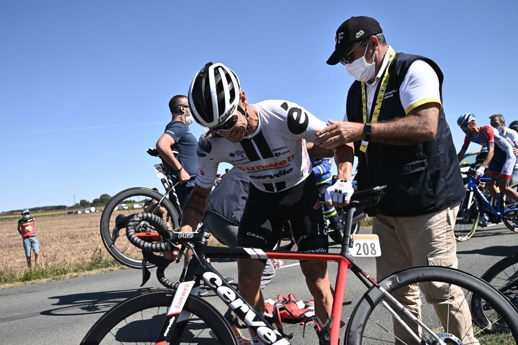 Team Sunweb rider Irelands Nicolas Roche is helped by medics after crashing during the 10th stage of the 107th edition of the Tour de France cycling race 170 km between Le Chateau dOleron and Saint Martin de Re on September 8 2020 Photo by AnneChristine POUJOULAT AFP Photo by ANNECHRISTINE POUJOULATAFP via Getty Images