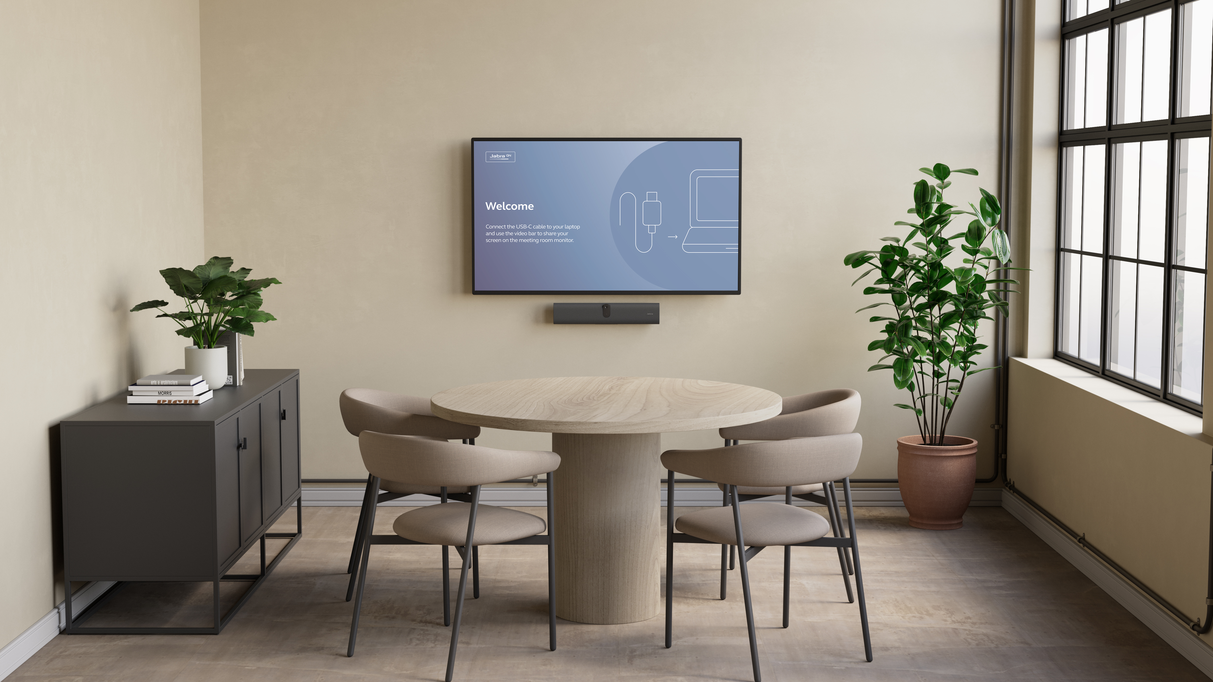 The new Jabra videobar in a pair of small conference rooms.