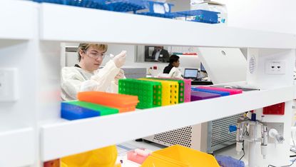 A scientist working on Pfizer vaccine development.