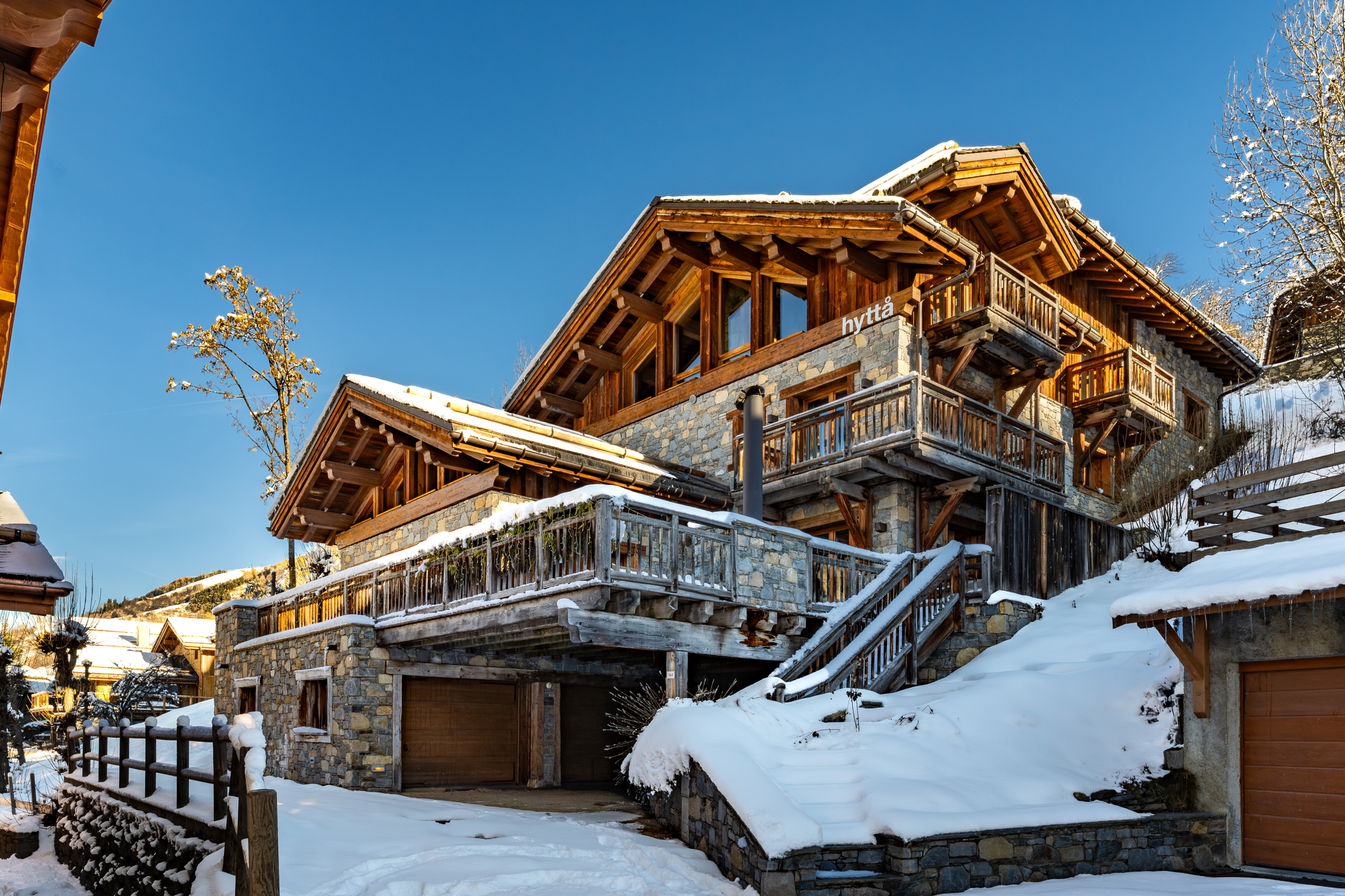 Images of the chalet in St Martin de belleville. lots of wood, lots of stone, lots of snow, lots of luxury