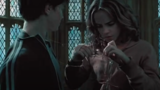 Harry and Hermione using the Time Turner in Harry Potter and the Prisoner of Azkaban.